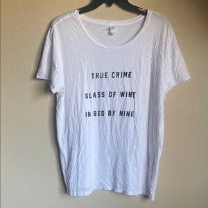 White Graphic Tee with logo true crime glass of wine in bed by none